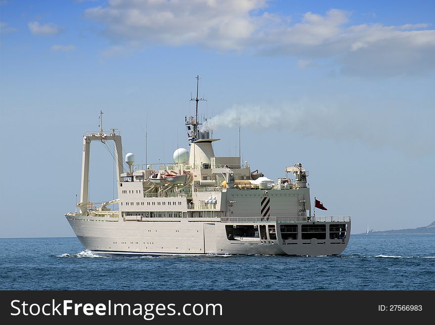 Merchant ship and tug