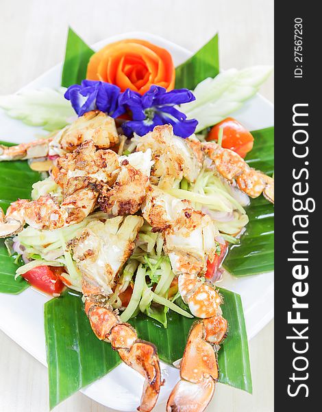 Thai seafood, crap salad with flowers decoration