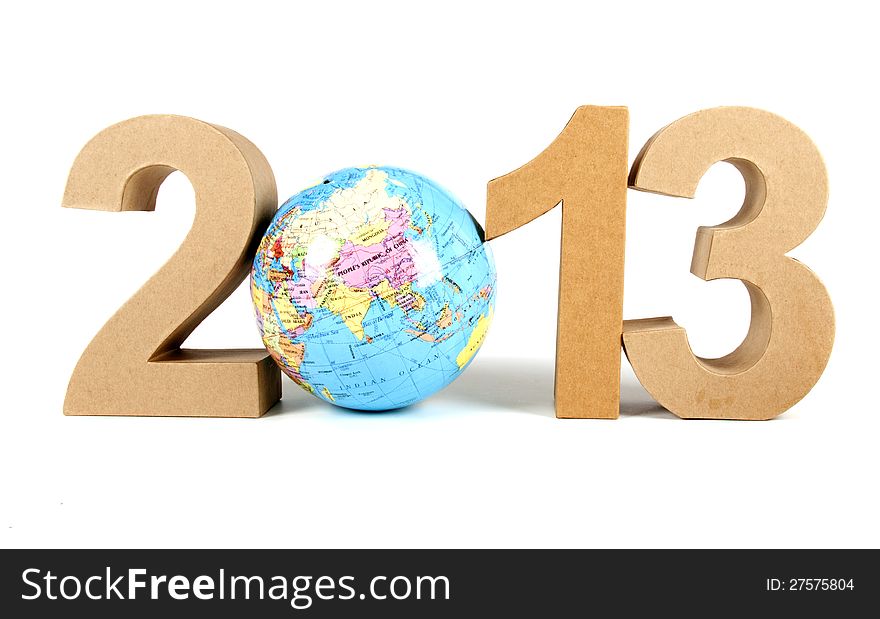 Paper numbers an a globe forming 2013 as for the new year. Paper numbers an a globe forming 2013 as for the new year