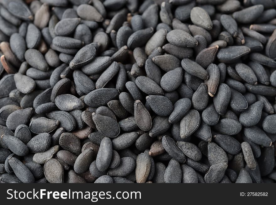 Black sesame seeds close-up background