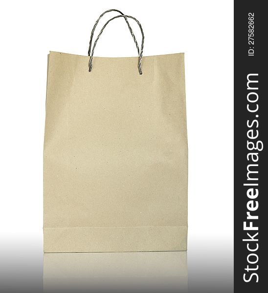 Brown paper bag on white background