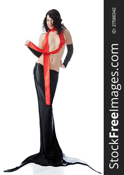 Photo attracting woman in exotic dress with red ribbon, posing in studio on white background. Photo attracting woman in exotic dress with red ribbon, posing in studio on white background