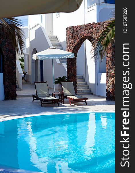 The cool swimming  pool, Greece, Santorini island. The cool swimming  pool, Greece, Santorini island