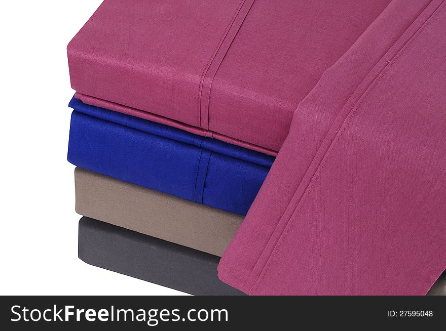Collection of bed sheets against white background. Collection of bed sheets against white background.