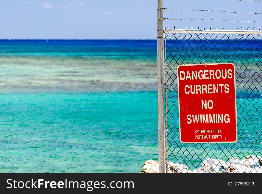 Dangerous currents sign no swimming