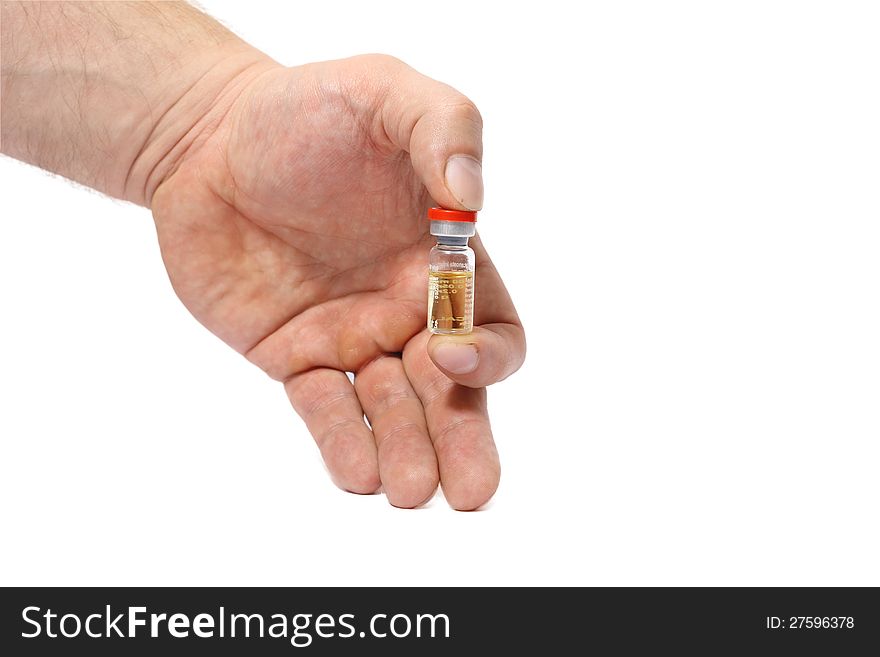Ampoule in a hand  on white background.