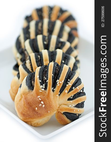 Sweet bread line with black sesame cream