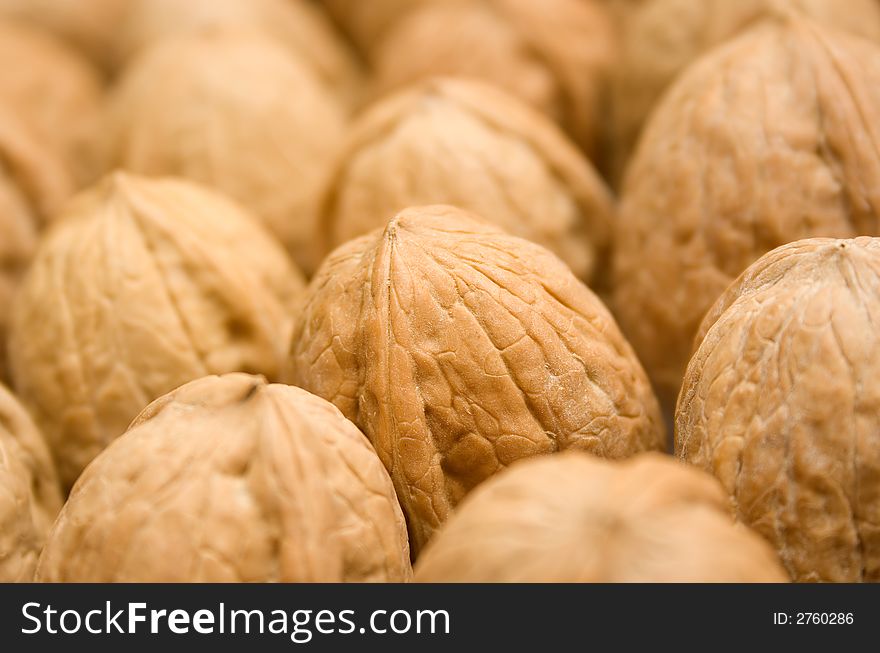 Lot of walnuts. Nice background or wallpaper.