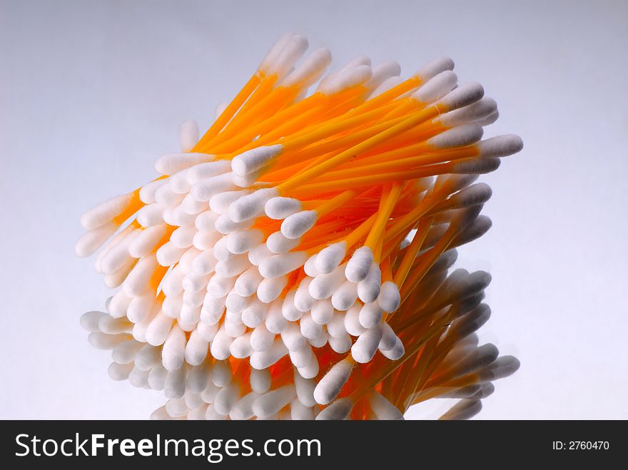 Hygienic sticks of orange color on  white background