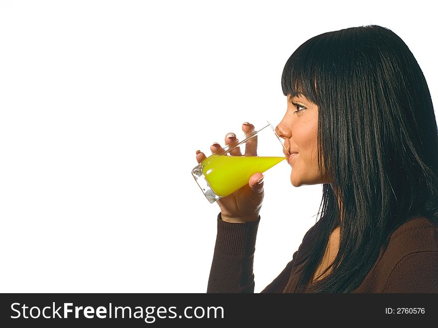 The girl with juice of a lemon on a white background