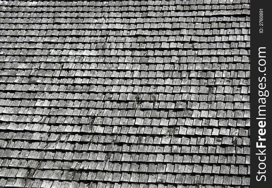 A roof with wooden bricks