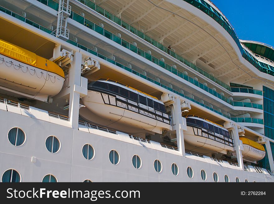 Cruise ship hull, balconies & rescue boats. Cruise ship hull, balconies & rescue boats.