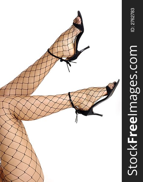Legs of lady in bodystocking . black shoes. over white background. Legs of lady in bodystocking . black shoes. over white background