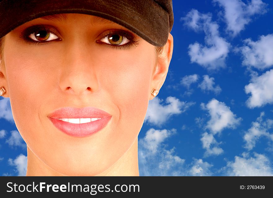 Young Girl In Cap With a Blue a blue sky