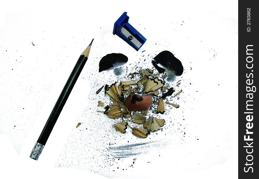 On a photo a sharpener and pencil is represented. On a photo a sharpener and pencil is represented