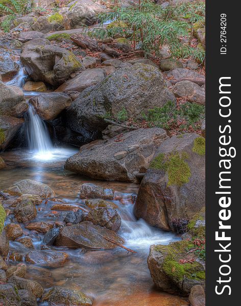 Spring waterfall in the forest