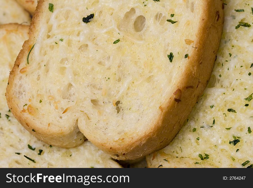 Macro shot of fresh hot garlic toast nice color