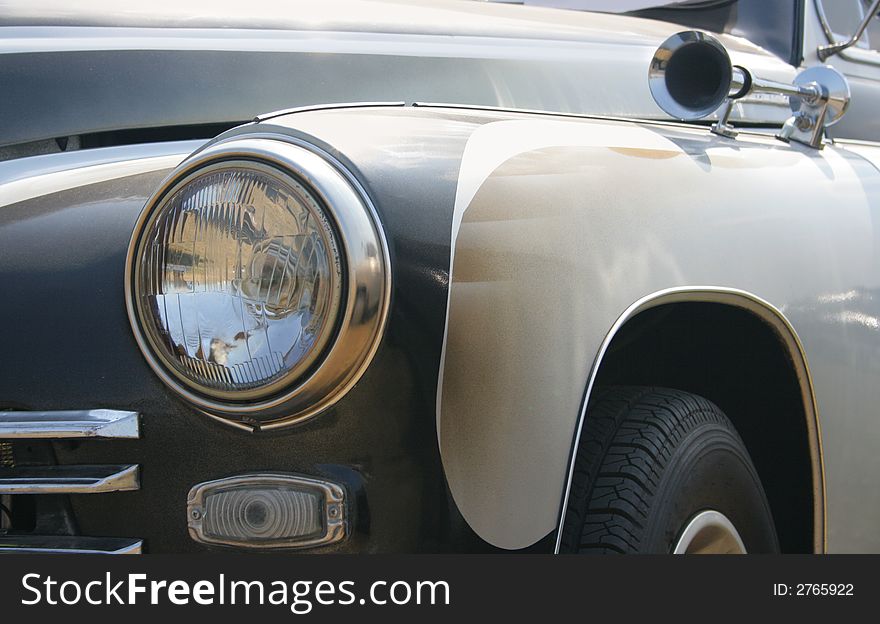 Classic and vintage cars - headlight and klaxon close-up 1950s