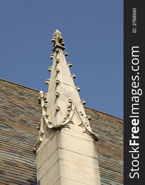 Close-up details of a Gothic Revival Architecture style building of stone built in the 1920 s. Close-up details of a Gothic Revival Architecture style building of stone built in the 1920 s