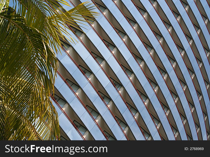 Abstract Image of High-rise Building with palm trees. Abstract Image of High-rise Building with palm trees.