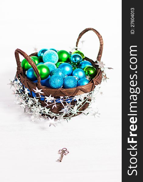 Christmas decoration with different balls and tinsel on white background