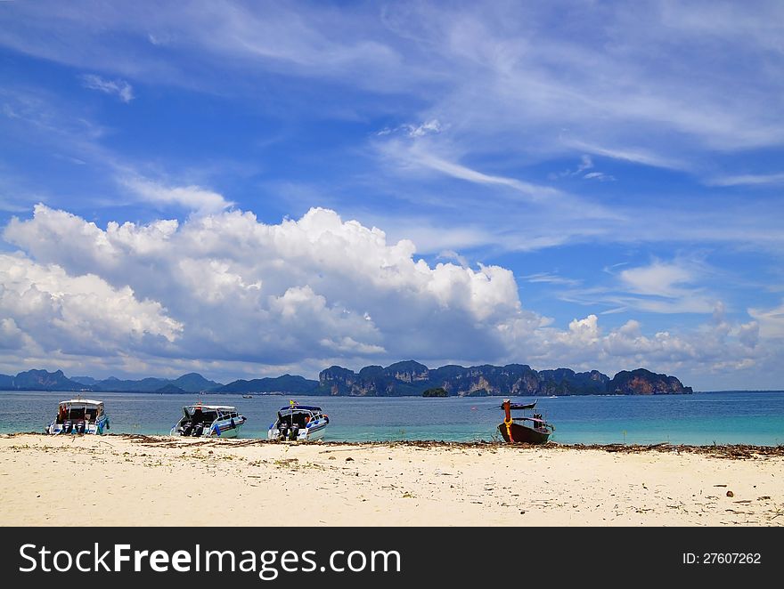 Long tail boat on the beach.