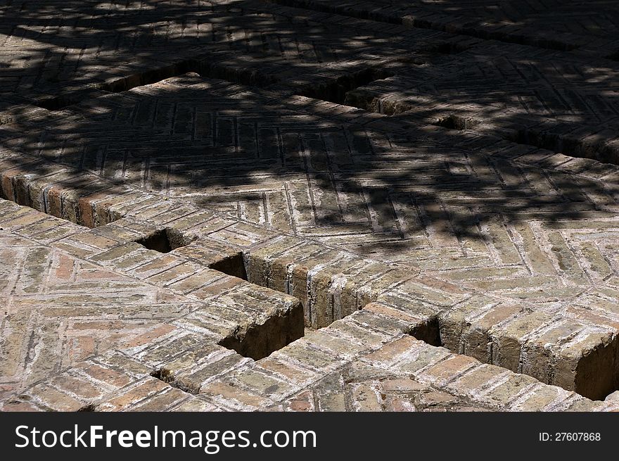 Brick-built ground with system of water mains in the mosque-cathedral of Cordoba, Andalusia, Spain. Brick-built ground with system of water mains in the mosque-cathedral of Cordoba, Andalusia, Spain.