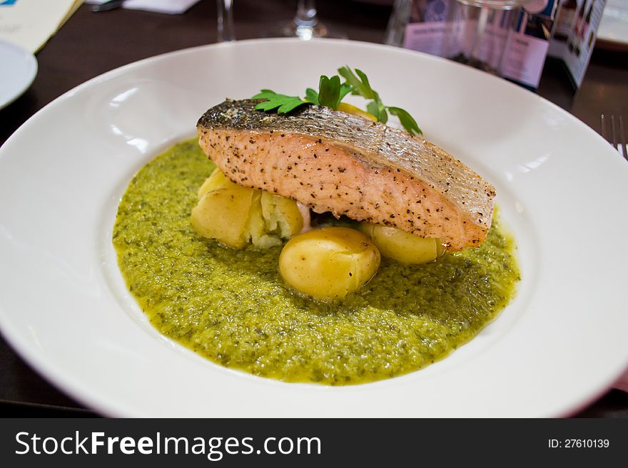 Loch Duart Salmon Fillet with boiled new potatoes & pea puree. Scottish fish dish. Loch Duart Salmon Fillet with boiled new potatoes & pea puree. Scottish fish dish