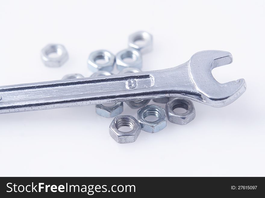 Silver wrench,  on white background