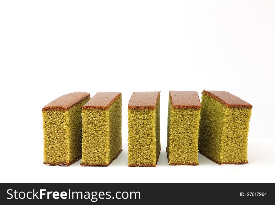 Sponge cake , Green tea isolated on white background