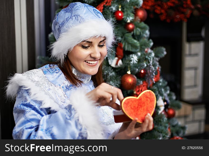 Happy Woman With Christmas Costume Receives Gift