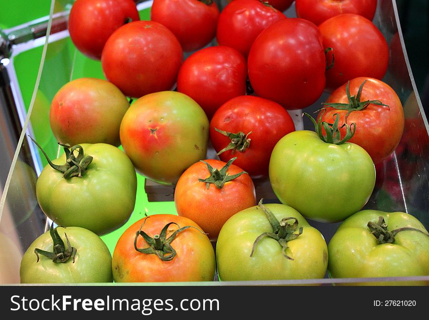 A lot of tomatoes exposed and lighted