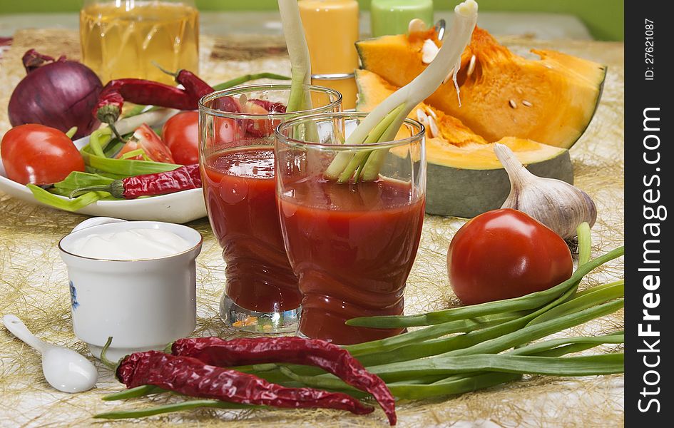 Tomato Juice and group of different vegetables