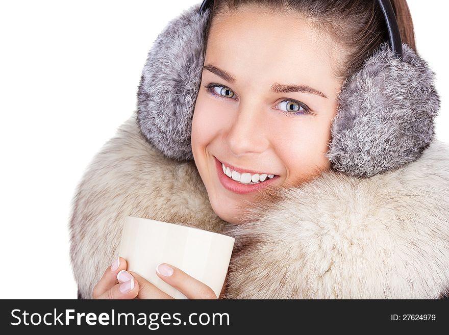 Beautiful young girl drinking coffee or tea. Beautiful young girl drinking coffee or tea