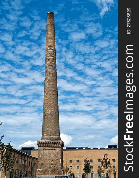 Factory plant with a chimney industry background. Factory plant with a chimney industry background