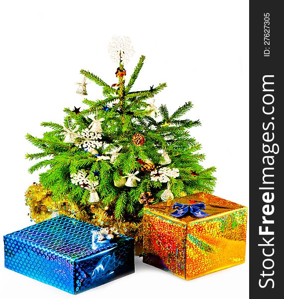 Christmas tree with gifts on a white background