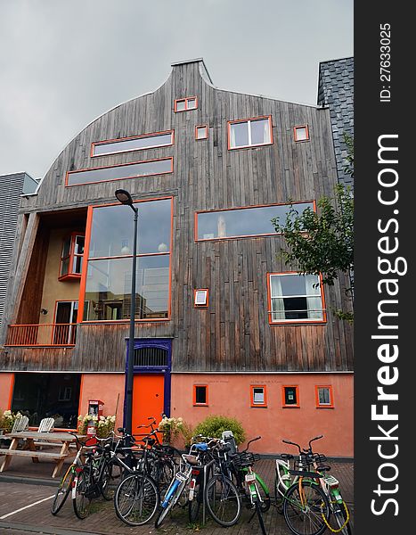 This image presents a modern, yet strange facade of a building from Amsterdam. This image presents a modern, yet strange facade of a building from Amsterdam