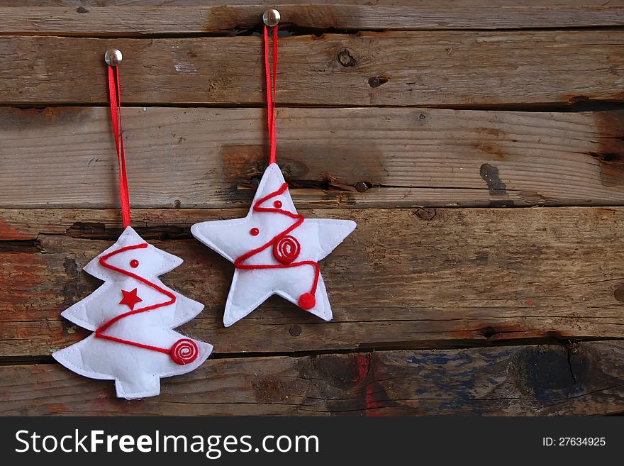 Photo of christmas decorations on wooden background. Photo of christmas decorations on wooden background