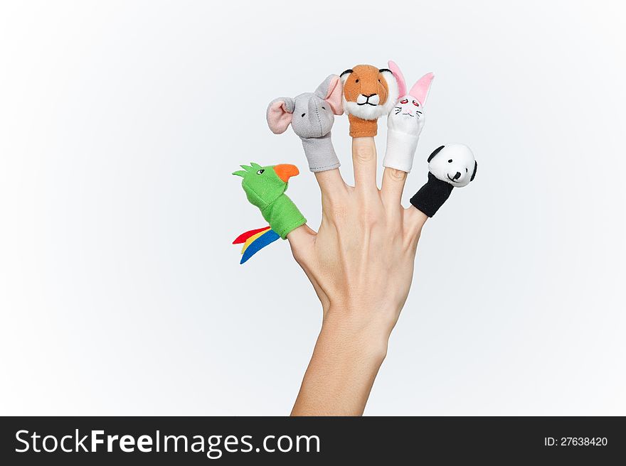 Female hand with animal finger puppets. Female hand with animal finger puppets