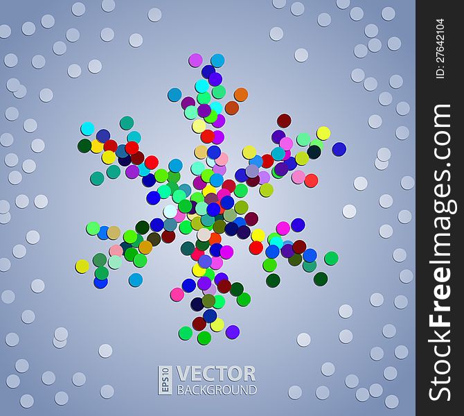 Christmas colorful confetti snowflake on the grey background with white snow. Christmas colorful confetti snowflake on the grey background with white snow