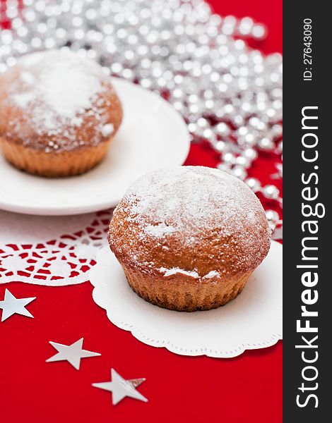 Christmas muffins on red background. Christmas muffins on red background