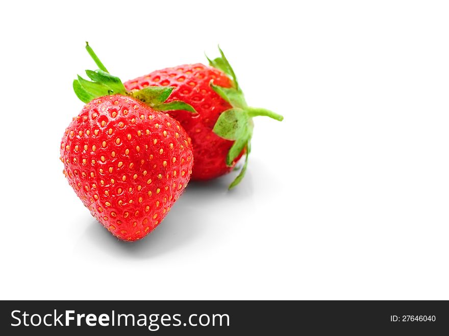Two Strawberries  On A White Background