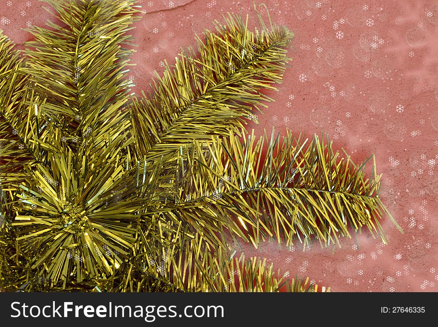 Golden Christmas star decoration on the dark pink background