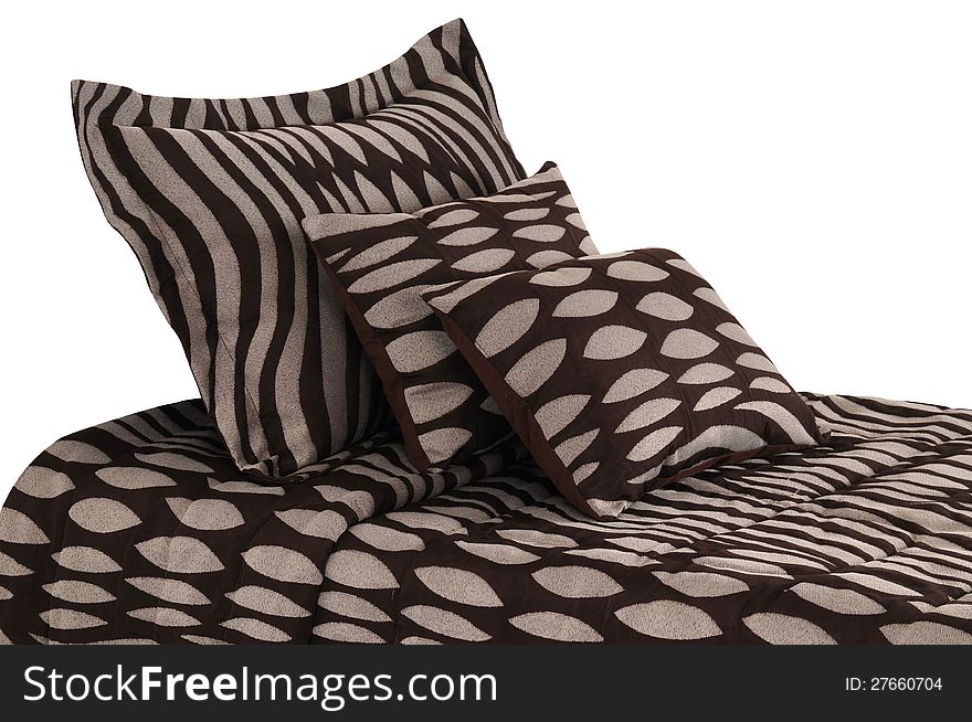 Soft pillows on comfortable bed spreads. Soft pillows on comfortable bed spreads.