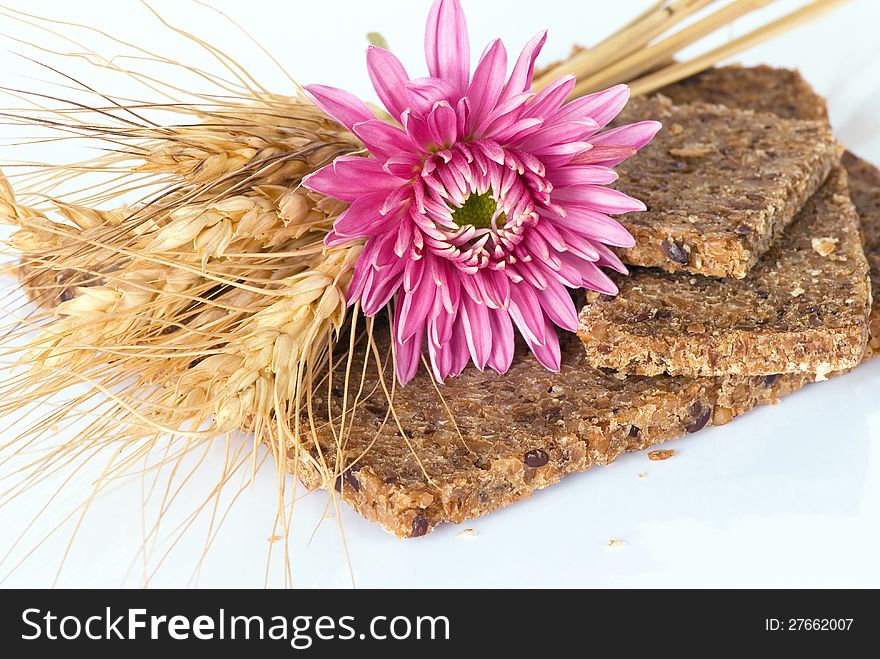 Whole Wheat Bread With Ears Of Wheat And Flower