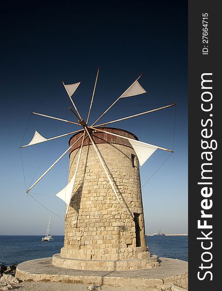 Mandraki Harbour windmill on the Island of Rhodes Greece