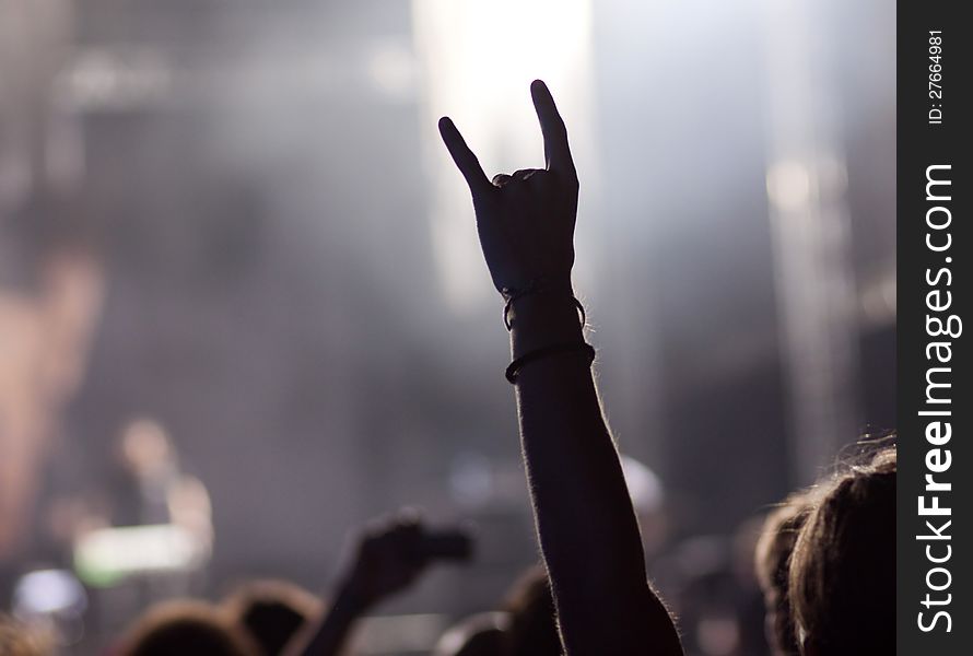 Crowd at concert and stage lights