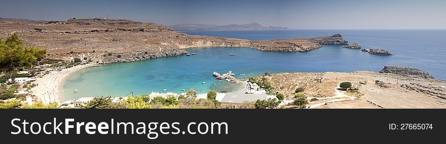 Greece, Rhodes Island, Lindos, view at the acropolis and the popular St.Pauls bay