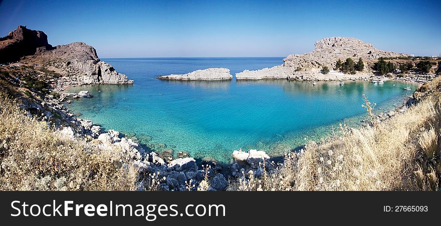 Greece, Rhodes Island, Lindos, view at the acropolis and the popular St.Pauls bay