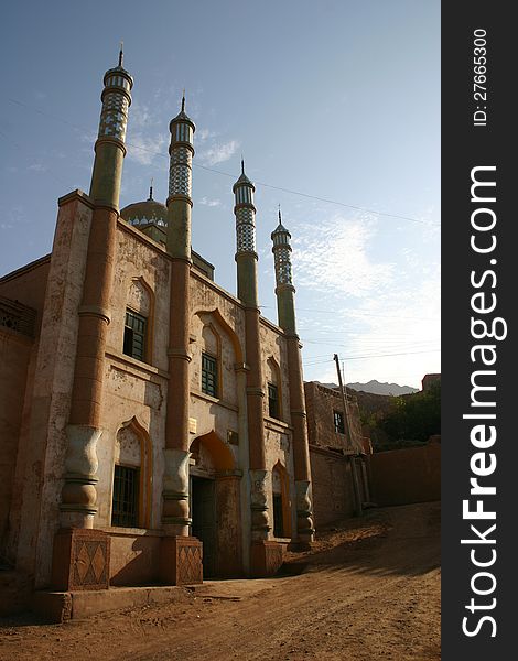 Mosque in the centre of a mud town in Western China. Mosque in the centre of a mud town in Western China